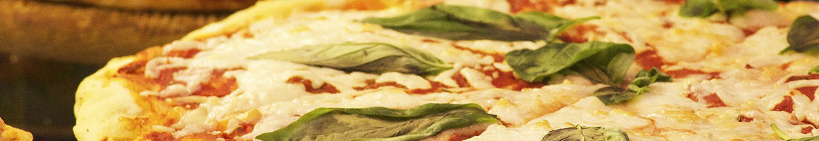 Eating Italian Pizza at Vocelli Pizza restaurant in Fredericksburg, VA.